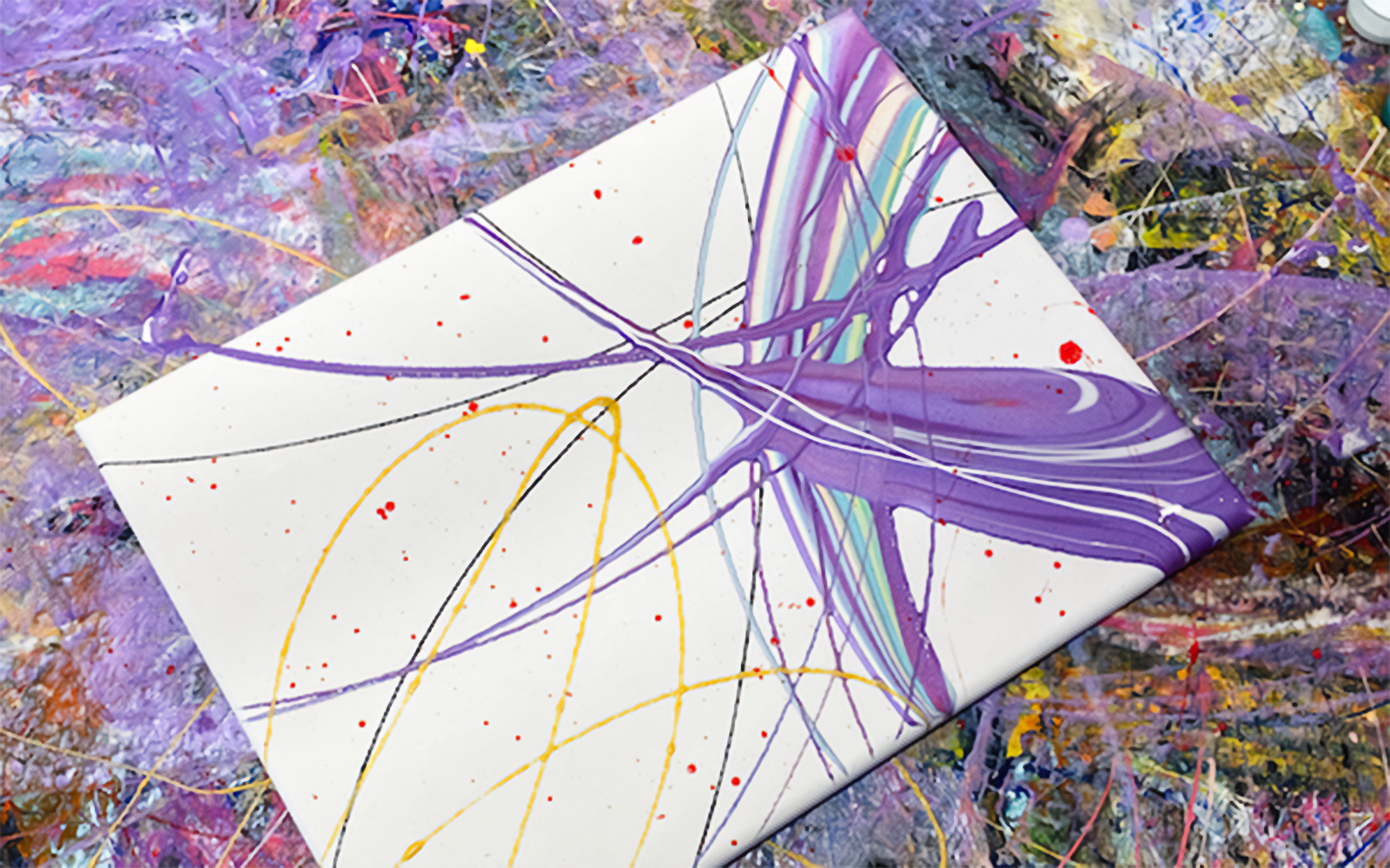 Abstract painting with purple, yellow, and red lines at Motion Art Space.