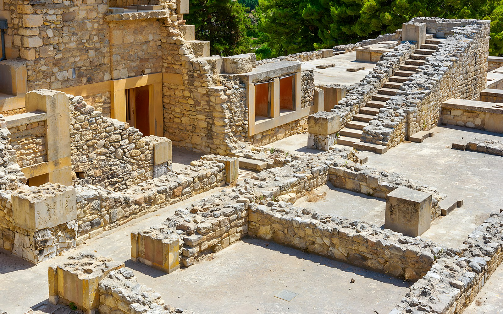 Knossos Palace rooms and stairs showcasing ancient Minoan architecture in Crete, Greece.