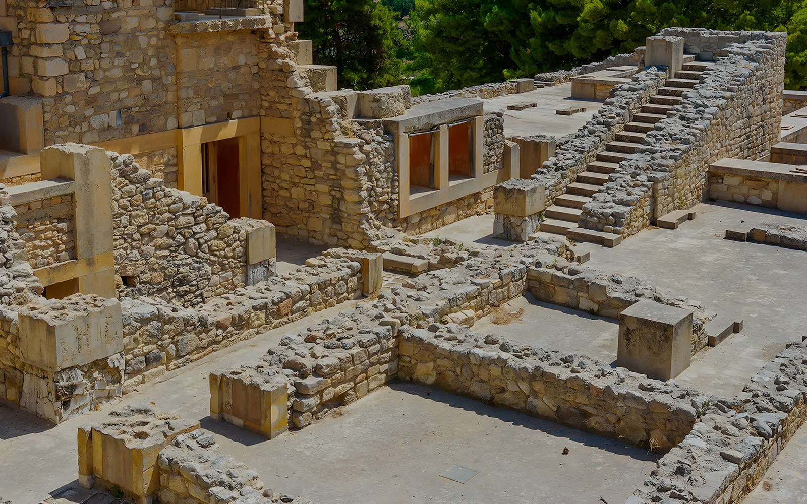 Knossos Palace rooms and stairs showcasing ancient Minoan architecture in Crete, Greece.