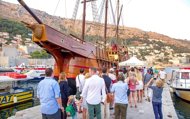 Guests boarding Karaka Ship for Sunset Cruise in Dubrovnik, Croatia.
