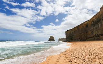 Great Ocean Road coastline with cliffs and ocean waves, Melbourne tour.