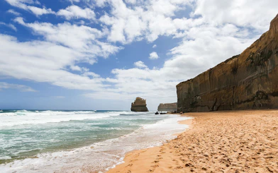 Great Ocean Road coastline with cliffs and ocean waves, Melbourne tour.