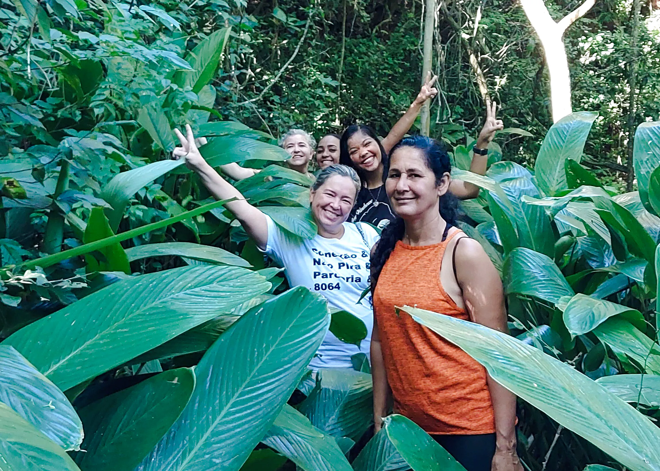 Group exploring lush jungle in Búzios, Rio de Janeiro during Emerências + José Gonçalves adventure.