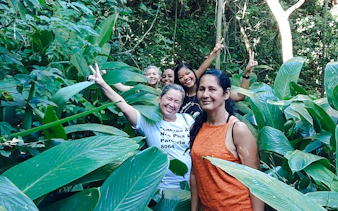 Group exploring lush jungle in Búzios, Rio de Janeiro during Emerências + José Gonçalves adventure.
