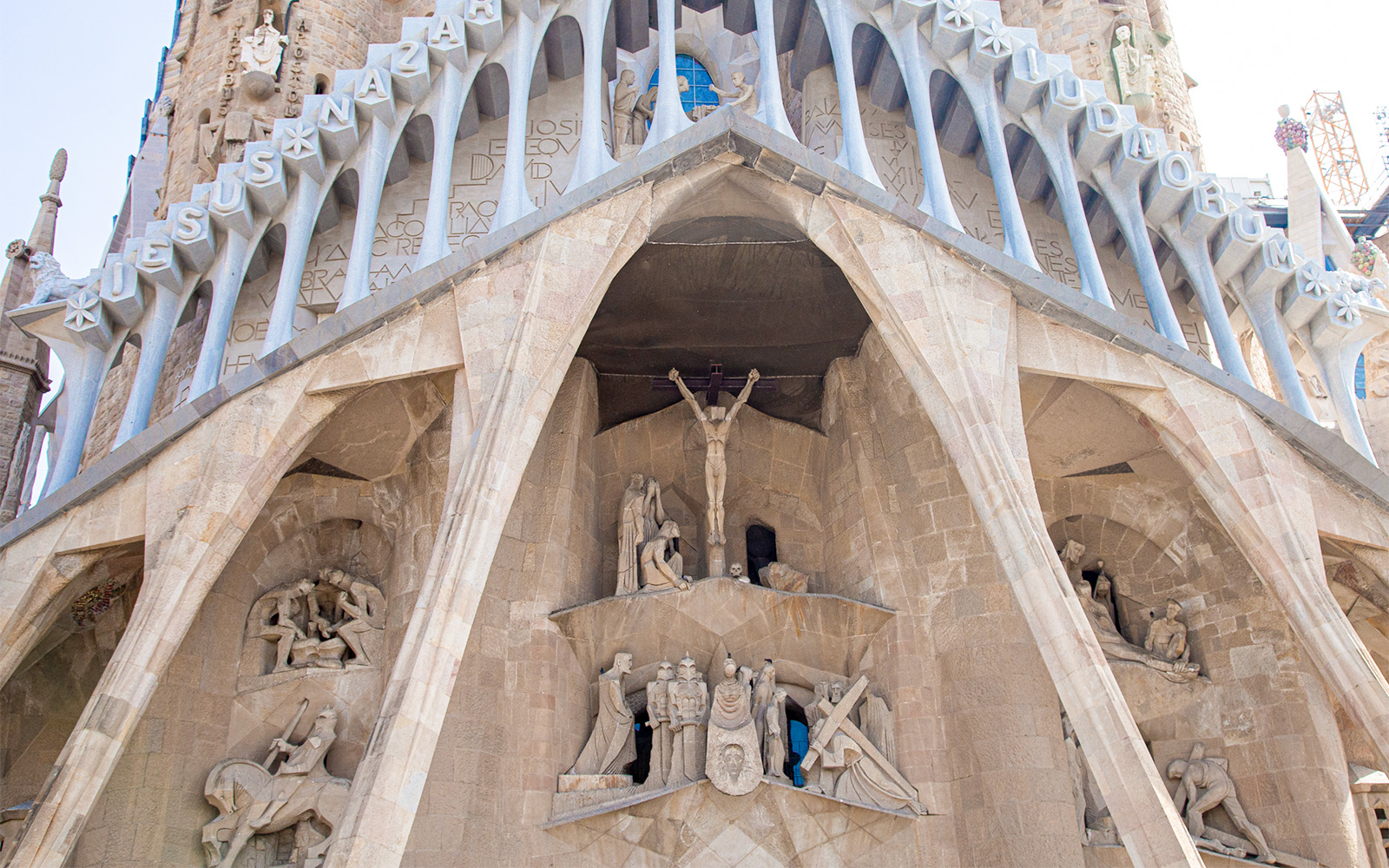 Sagrada Familia Passion Facade sculptures in Barcelona, Spain, depicting biblical scenes.