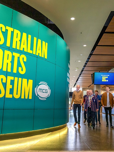 Australian Sports Museum entrance with visitors on MCG tour.