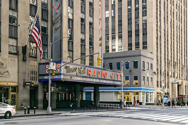 Radio City Music Hall exterior view during Rockefeller Center guided tour in New York City.