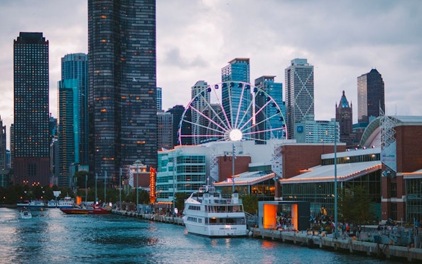 Skyline view of Chicago with Ferris wheel during Odyssey Lake Michigan Dinner Cruise.