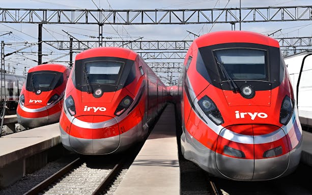 High-speed trains at Madrid Atocha station for one-way travel to Zaragoza Delicias.