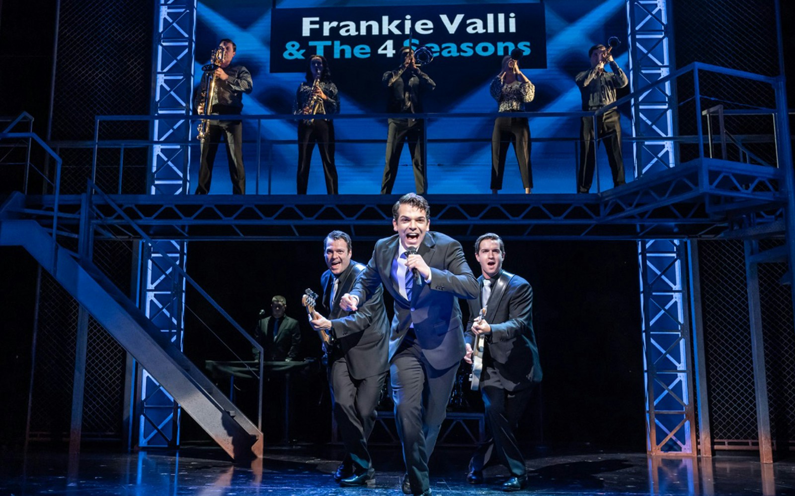 Jersey Boys musical performance with singers and band on stage