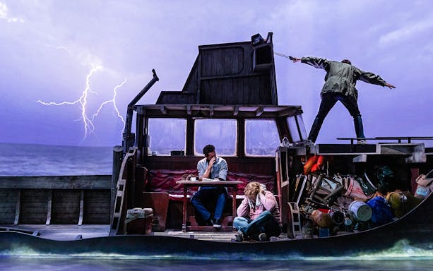 Stage scene from "The Shark is Broken" with actors on a boat during a storm.