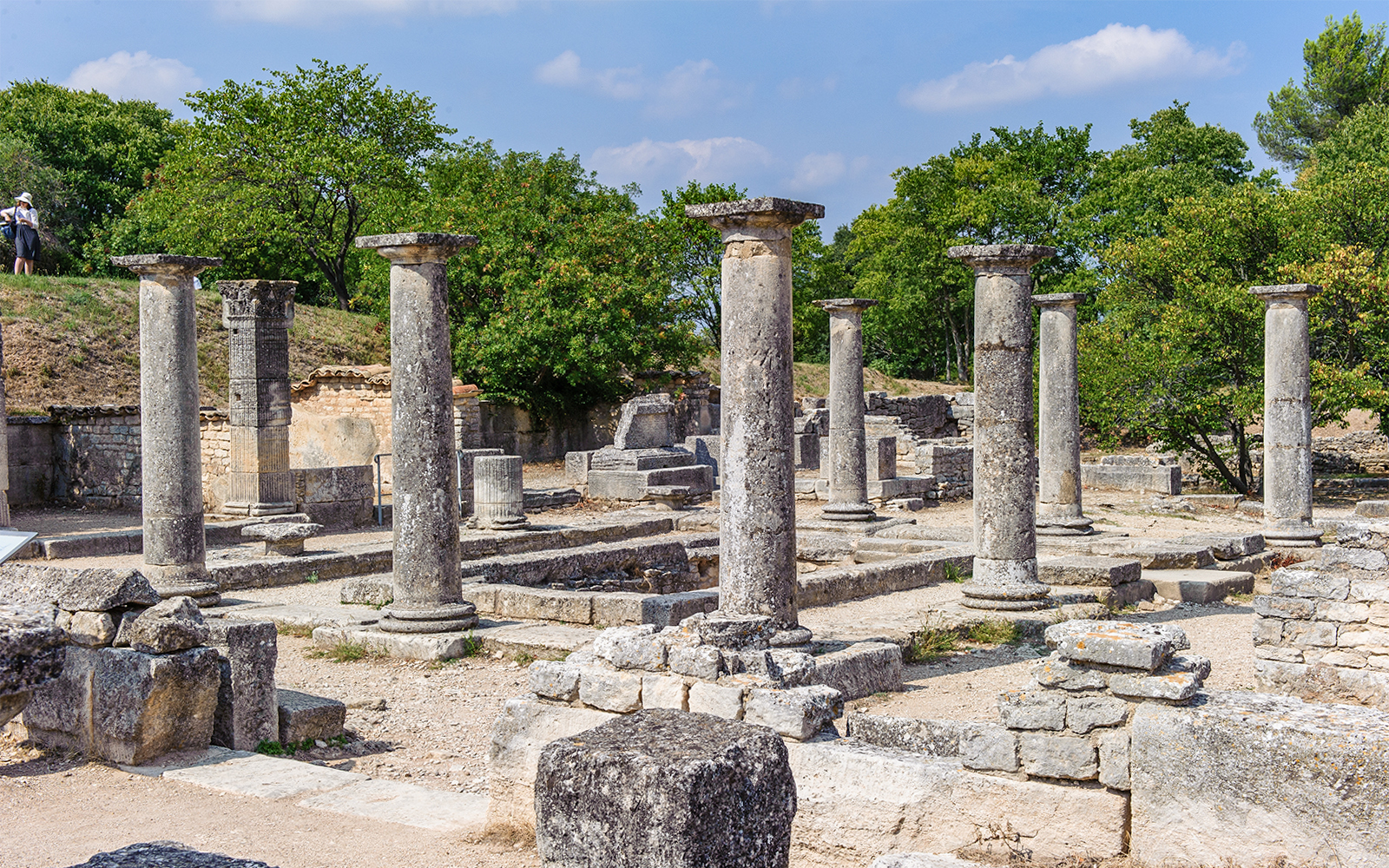 Ancient stone columns at Glanum Archaeological Site in Saint-Rémy-de-Provence, France.