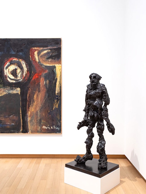 Installation view of abstract paintings and sculpture at Stedelijk Museum exhibition.