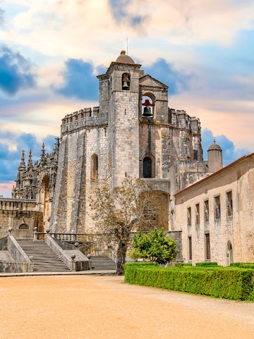 Convent of Christ in Tomar, Portugal, featuring the round Templar church and bell tower.