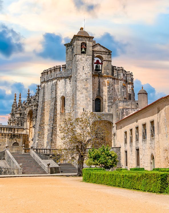 Convent of Christ in Tomar, Portugal, featuring the round Templar church and bell tower.
