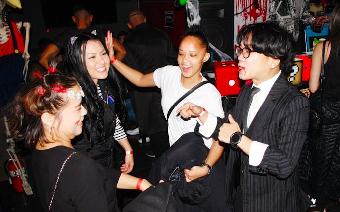 Group enjoying a lively night out during the Busan Pub Crawl.