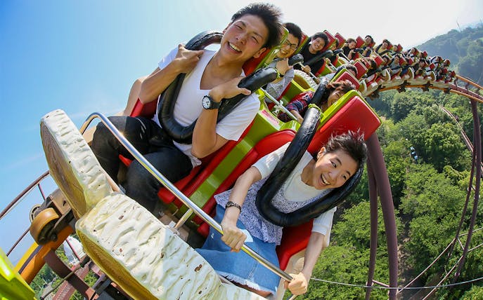 Riders enjoying a rollercoaster at Yomiuriland, Japan.