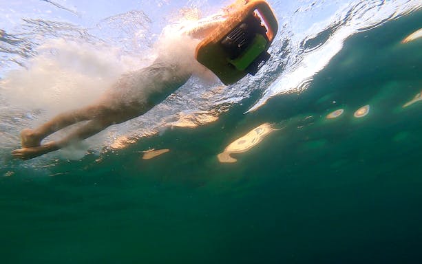 Person using underwater scooter in Nice, France.