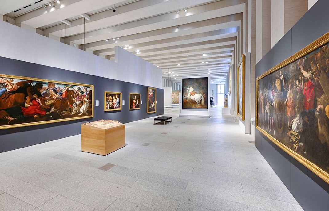 Royal Collections Gallery Madrid art collection with visitors viewing paintings