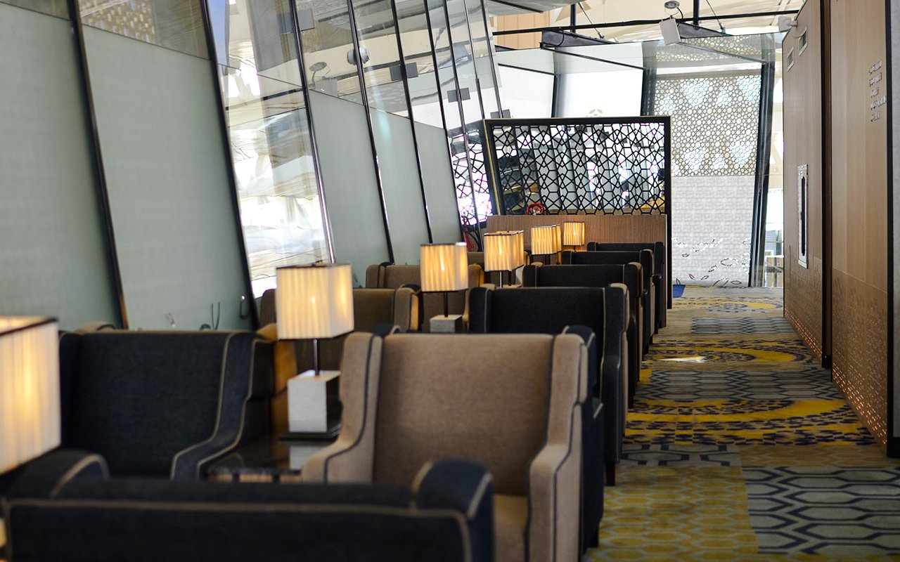 Seating area in Plaza Premium Lounge at King Abdulaziz International Airport.