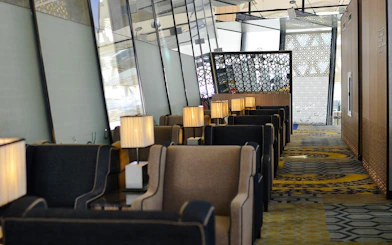 Seating area in Plaza Premium Lounge at King Abdulaziz International Airport.