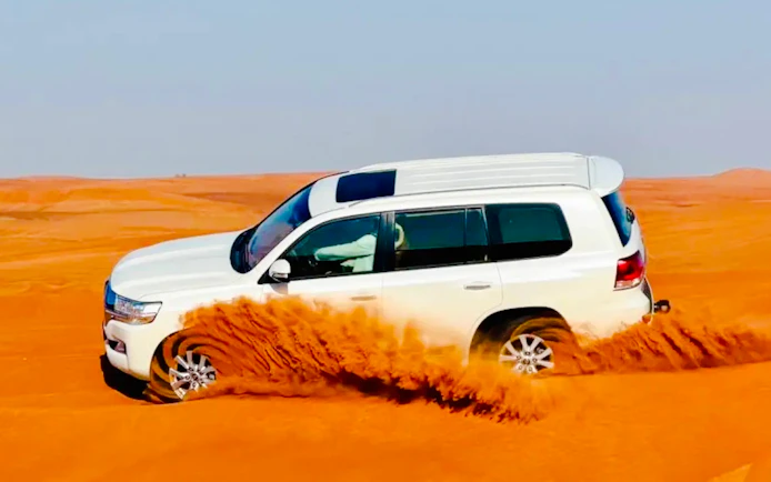 Dubai Evening Desert Safari with 4x4 Dune Bashing, BBQ Dinner, Live Shows & Hotel Transfers