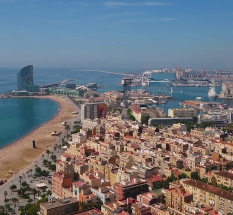 Gondolas on Venice's Grand Canal with historic buildings in the background.