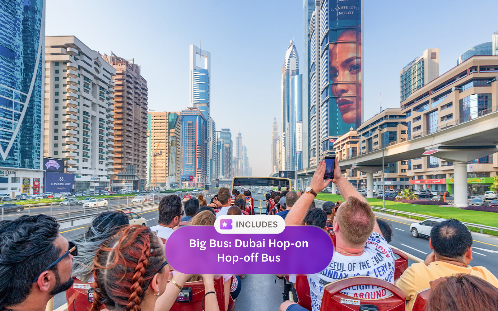 Dubai hop-on hop-off bus tour with view of city skyscrapers and landmarks.