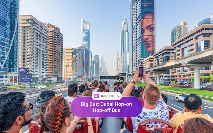 Dubai hop-on hop-off bus tour with view of city skyscrapers and landmarks.