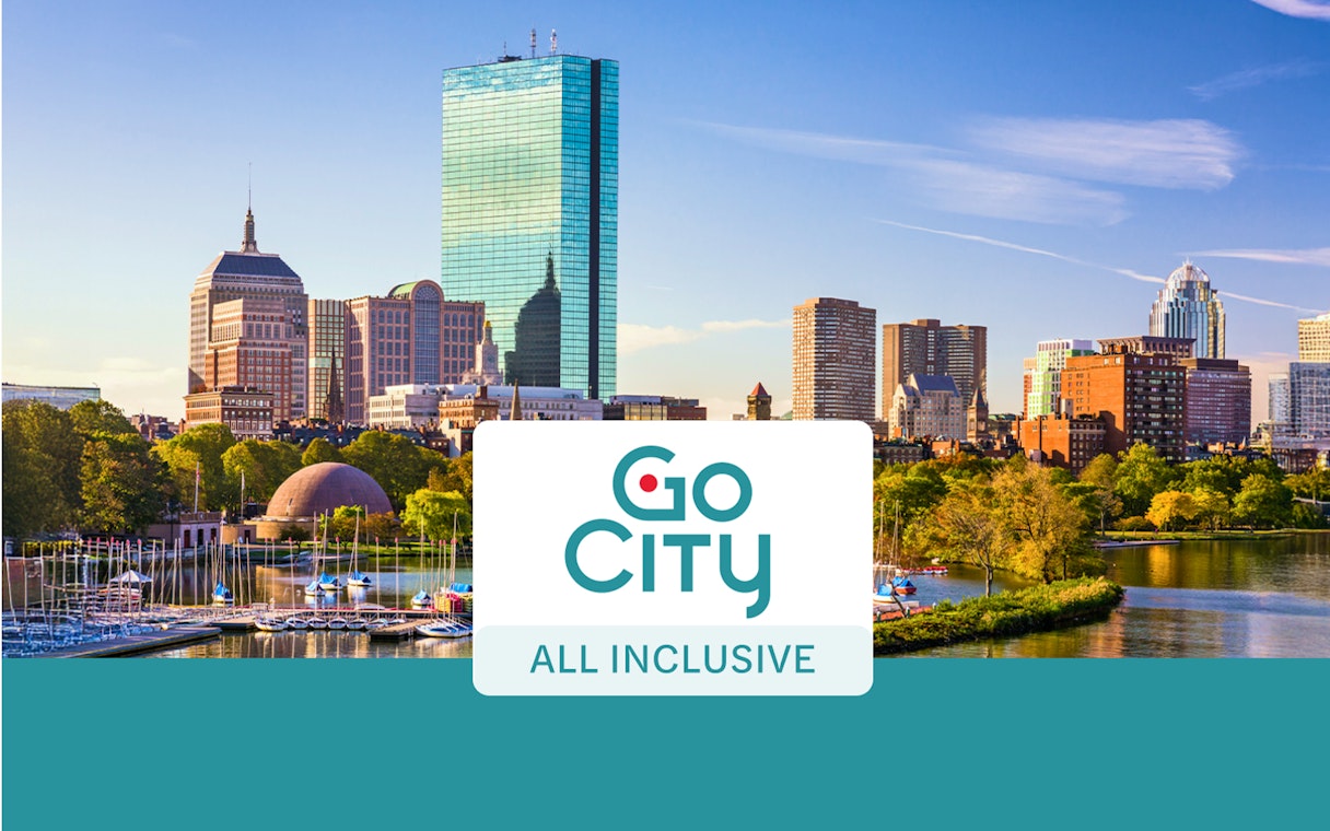 Boston skyline with sailboats on the Charles River, promoting Go City All-Inclusive Pass.