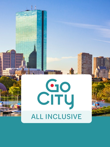 Boston skyline with sailboats on the Charles River, promoting Go City All-Inclusive Pass.