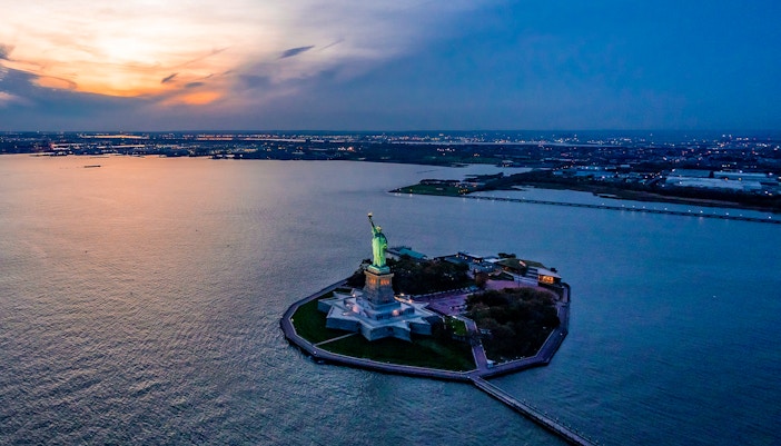 Statue of Liberty at sunset, view from private NYC tour from Westchester.