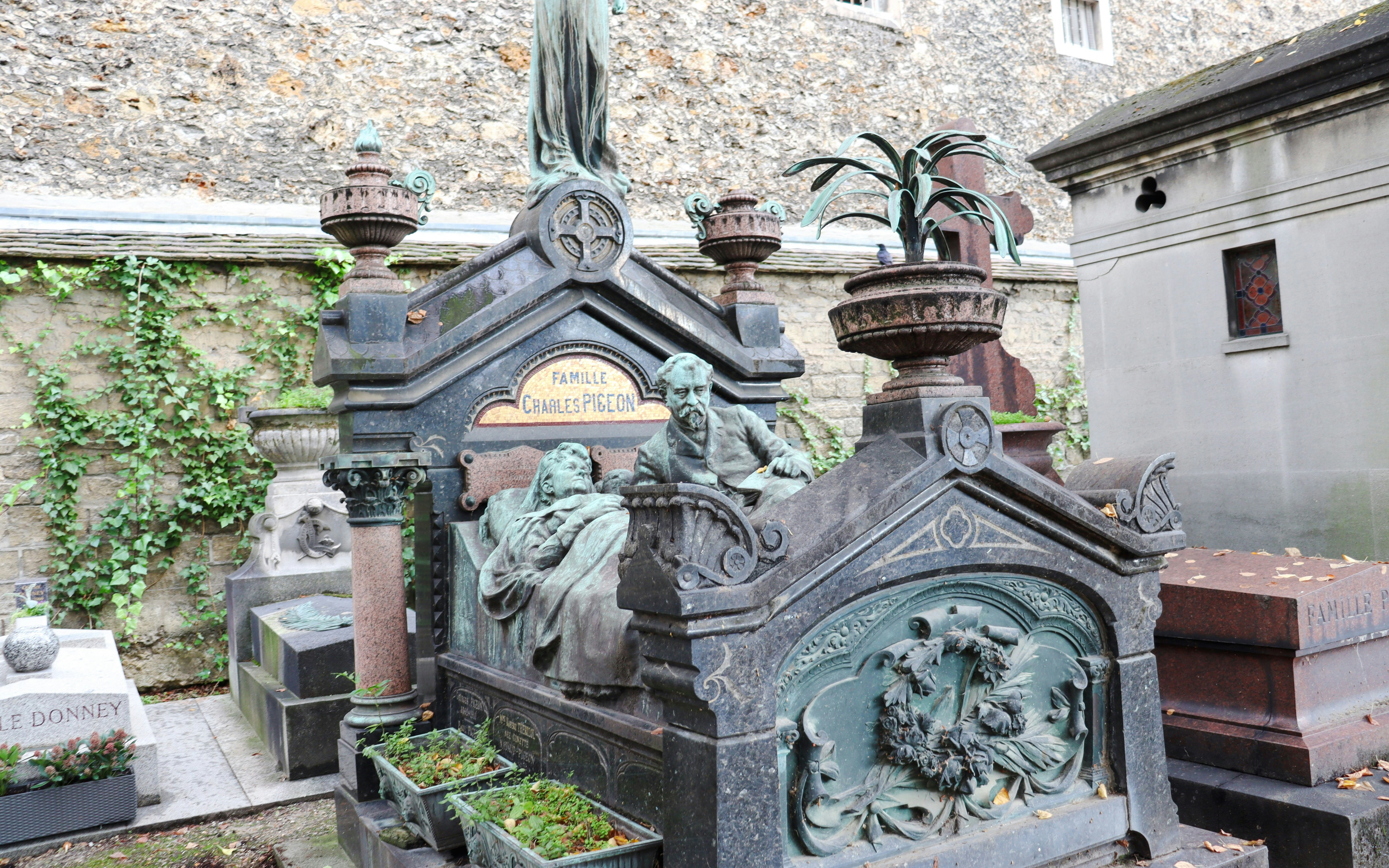 Tomb of Charles Pigeon with sculptures at Montparnasse Cemetery, Paris.