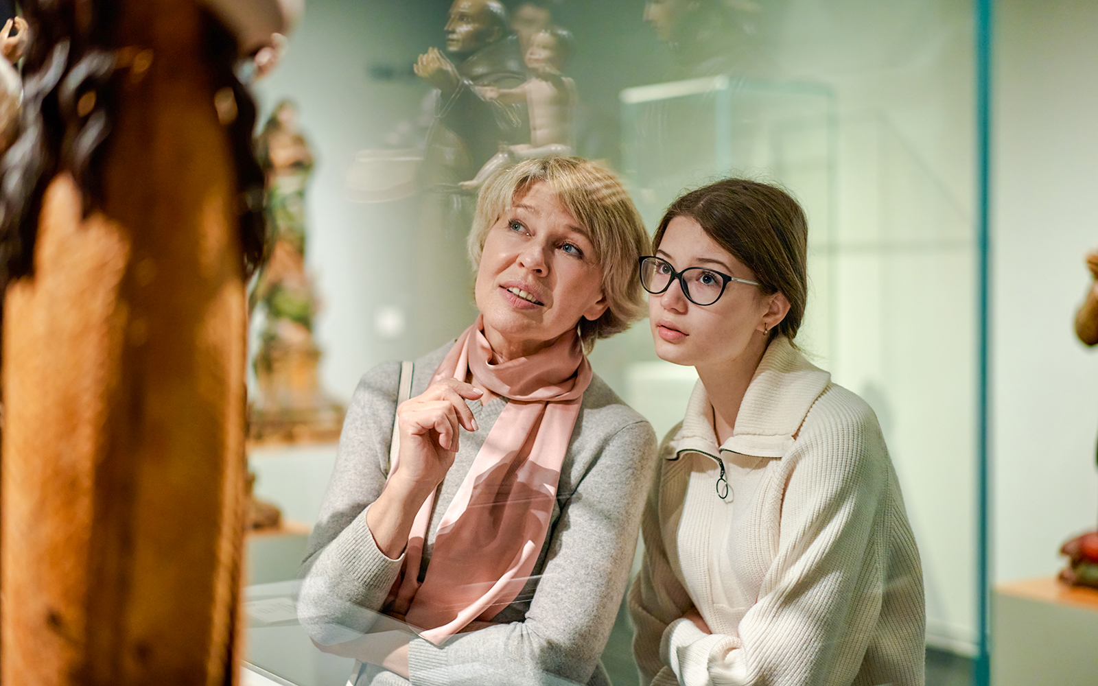 Visitors observing sculpture at Fondation Louis Vuitton, Paris.