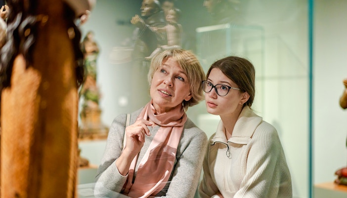 Visitors observing sculpture at Fondation Louis Vuitton, Paris.