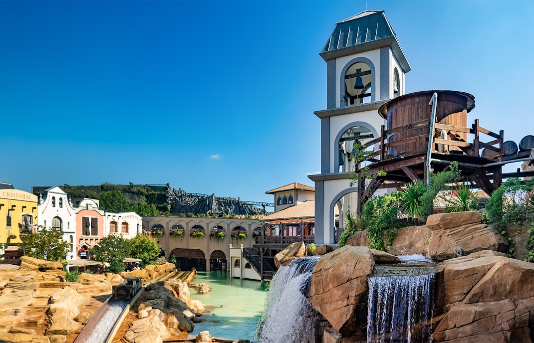 Chiapas water ride at Mexico theme park in Phantasialand with vibrant boats and lush surroundings.