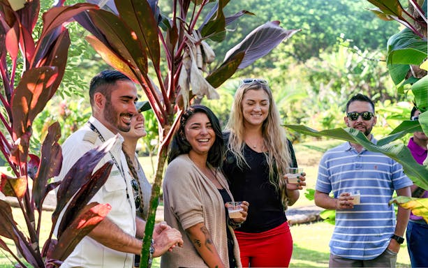 Tour group enjoying the Hana Rainforest Helicopter Tour in Hawaii.