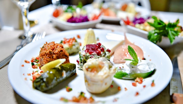 Turkish meze platter on a Bosphorus dinner cruise with private table.