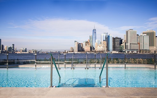 Rooftop pool with New York City skyline view, QC New York.