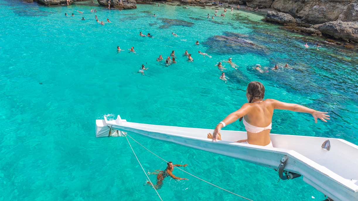 Girl on the slide off the cruise at A Cruise ship at The Blue Lagoon malta