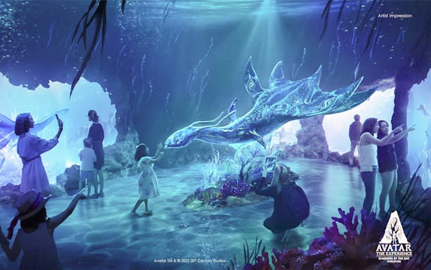 Visitors at Gardens by the Bay's Avatar Experience, interacting with a bioluminescent sea creature.
