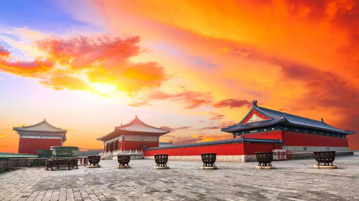 Forbidden City courtyard at sunset, Beijing, China, with traditional architecture.