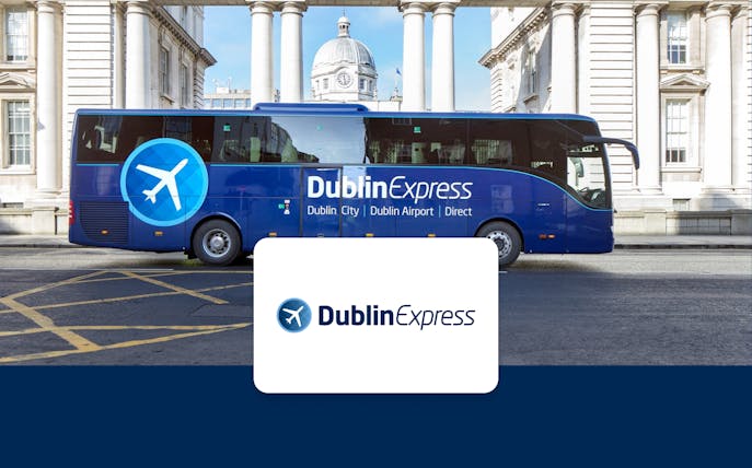 Dublin Express bus in front of historic building, offering one-way tickets from Belfast to Dublin Airport.