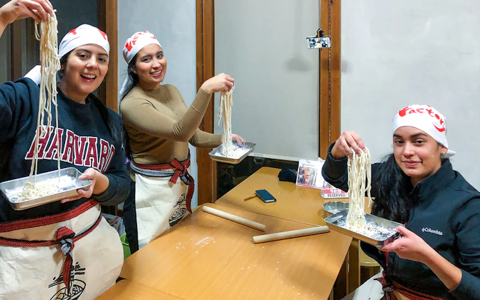Participants making noodles at Ramen Factory Kyoto cooking class.