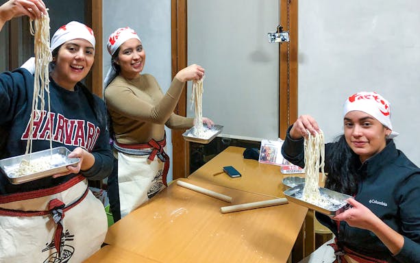 Participants making noodles at Ramen Factory Kyoto cooking class.