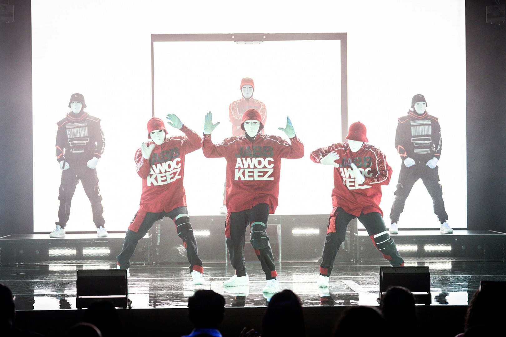 Jabbawockeez dancers performing on stage in Vegas show.