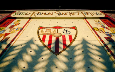 Ceramic mosaic mural on Ramón Sánchez Pizjuán Stadium facade, Sevilla FC, Seville, Spain.