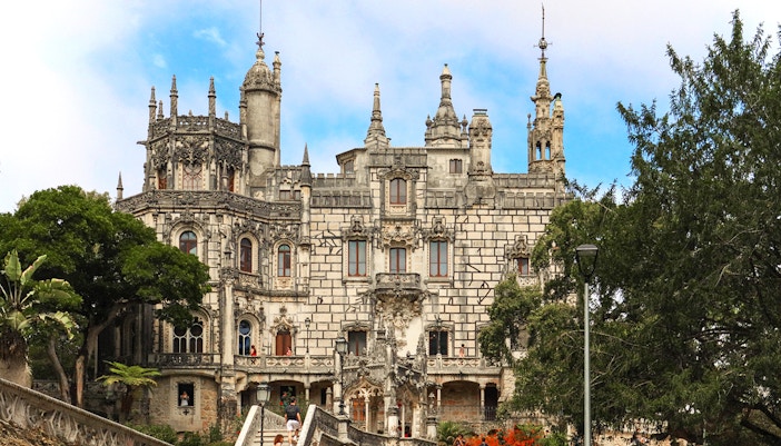 Quinta de Regaleira palace facade with ornate architecture in Sintra, Portugal.