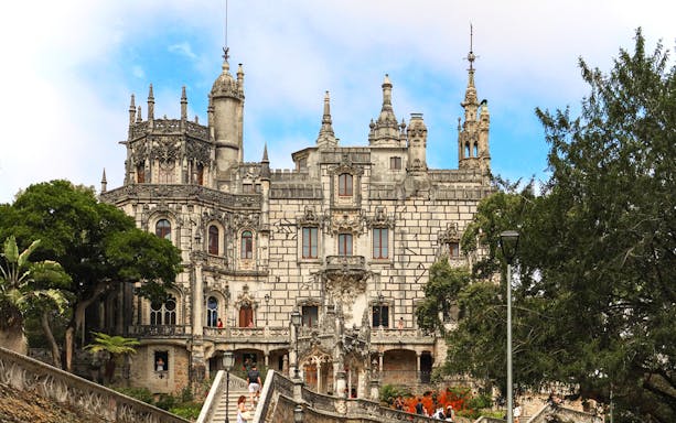 Quinta de Regaleira palace facade with ornate architecture in Sintra, Portugal.