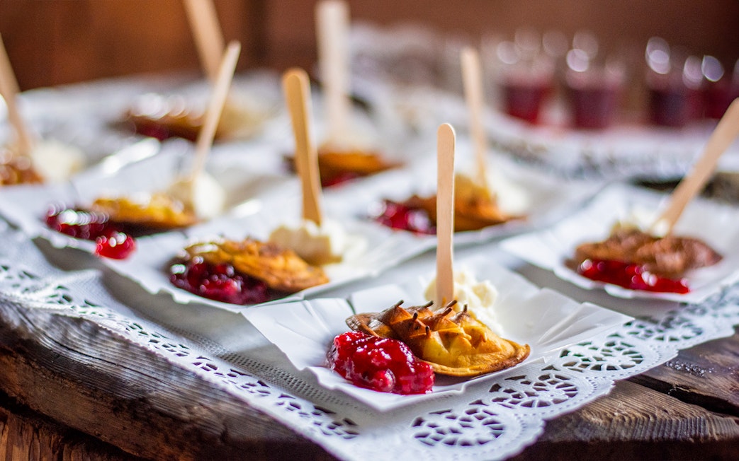 Cheese tasting plates with fruit preserves in Zakopane, Poland.